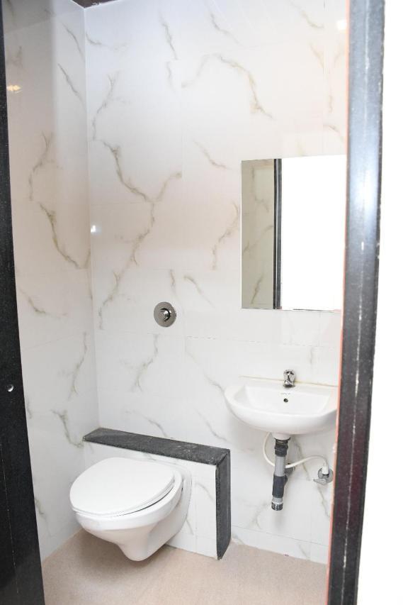 Hotel Sai Shatabdi Shirdi Oda fotoğraf